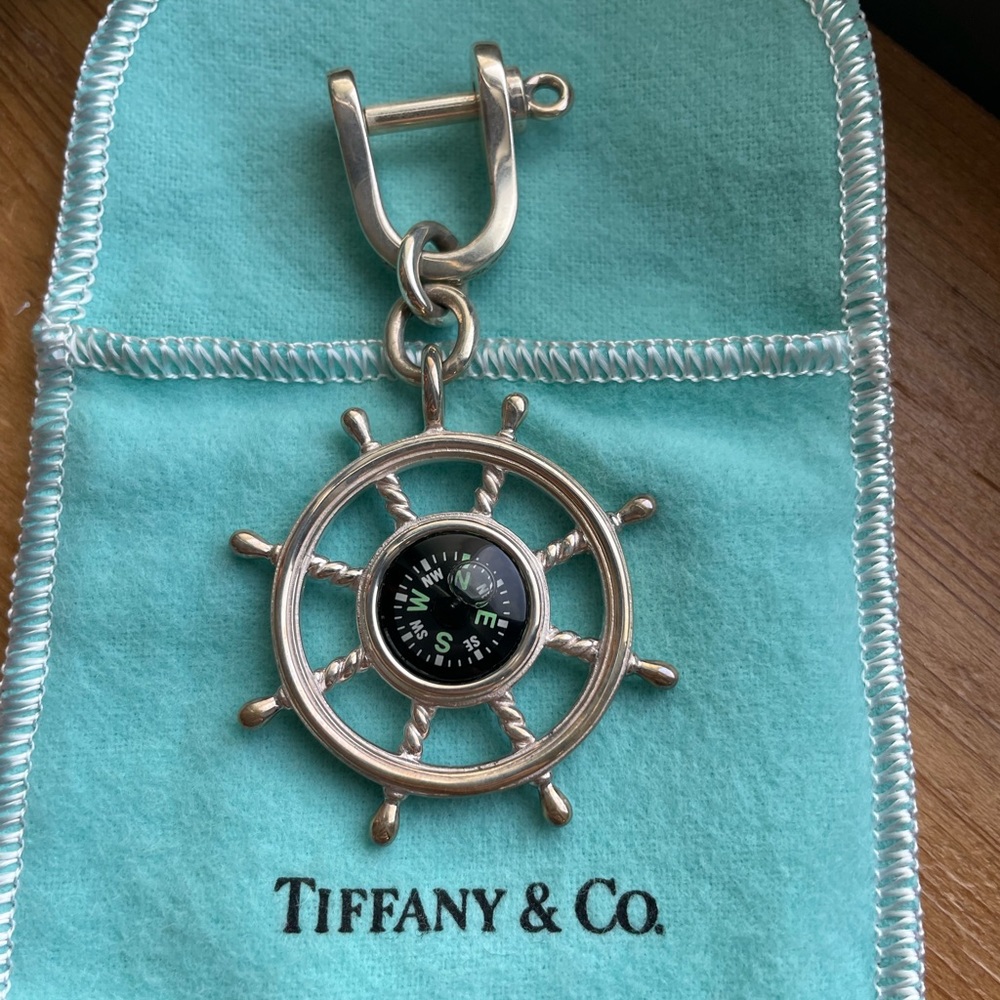 Tiffany & Co. sterling silver key ring "Ship's Wheel" with nautical compass.